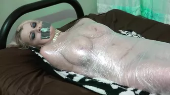 MsNadiaWhite - Harley Quinn Plastic Wrap Mummy 1 Of 3
